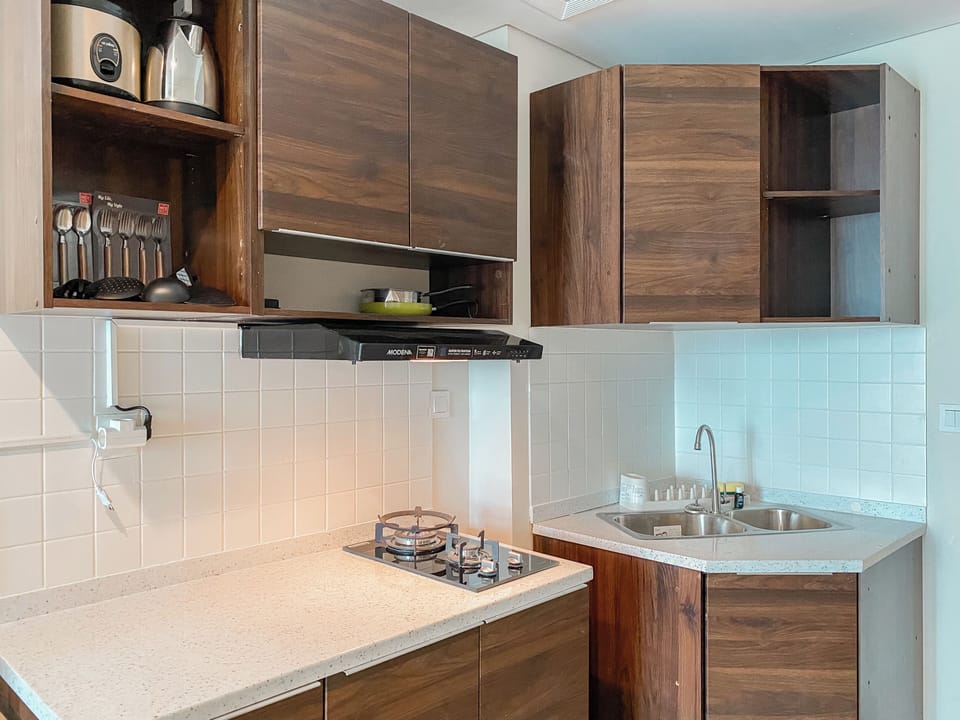 Apartment | Private kitchen | Fridge, stovetop, rice cooker, dining tables