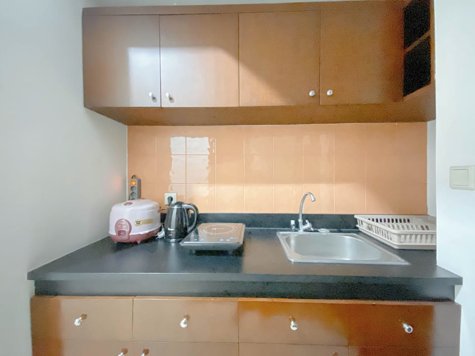 Apartment | Private kitchen | Mini-fridge, stovetop, rice cooker