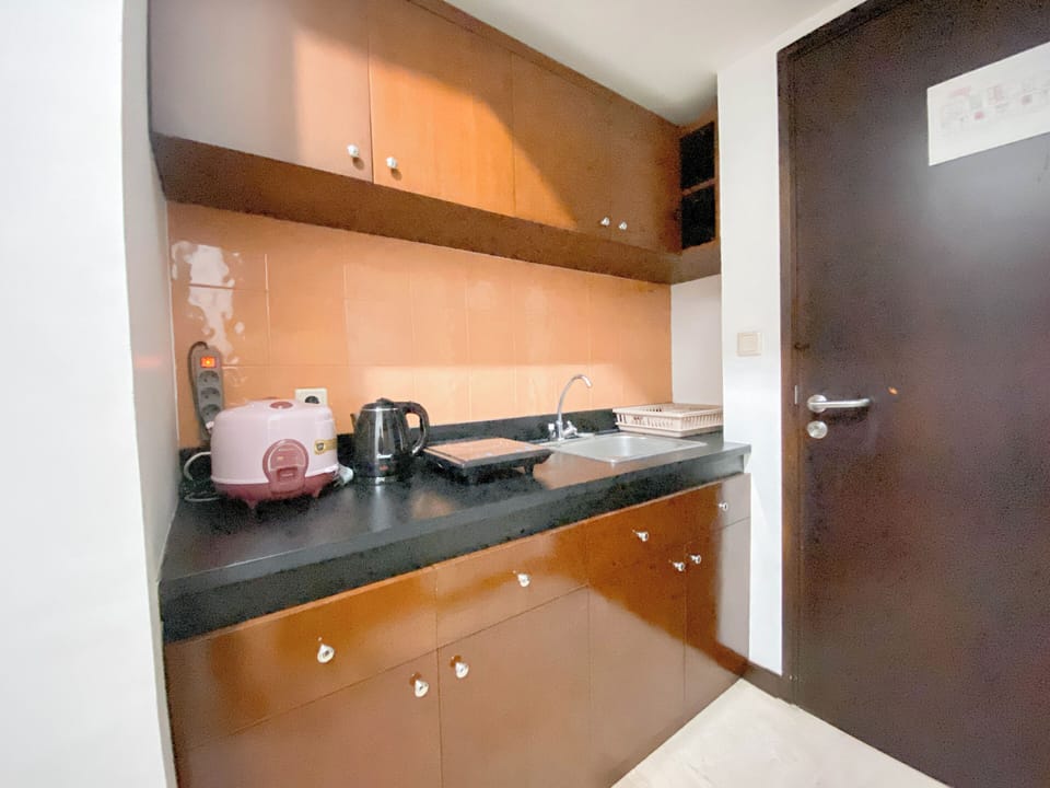 Mini-fridge, stovetop, rice cooker