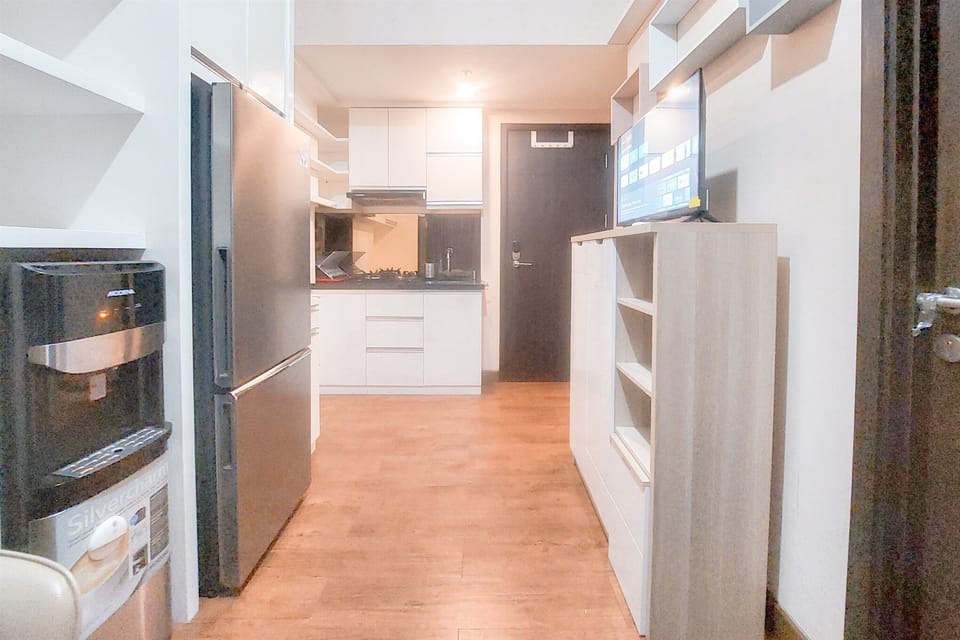 Apartment | Private kitchen | Fridge, stovetop, rice cooker, dining tables