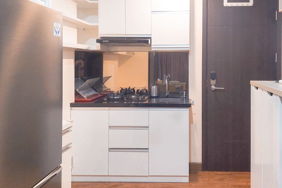 Apartment | Private kitchen | Fridge, stovetop, rice cooker, dining tables