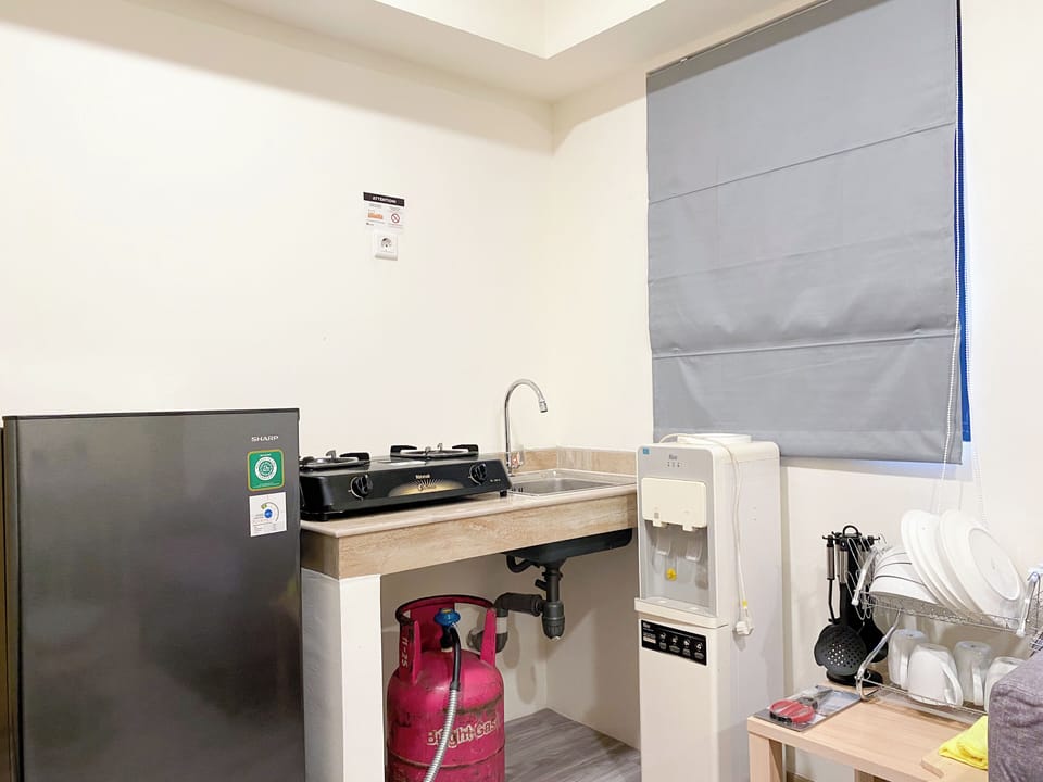 Apartment | Private kitchen | Fridge, stovetop, electric kettle, rice cooker