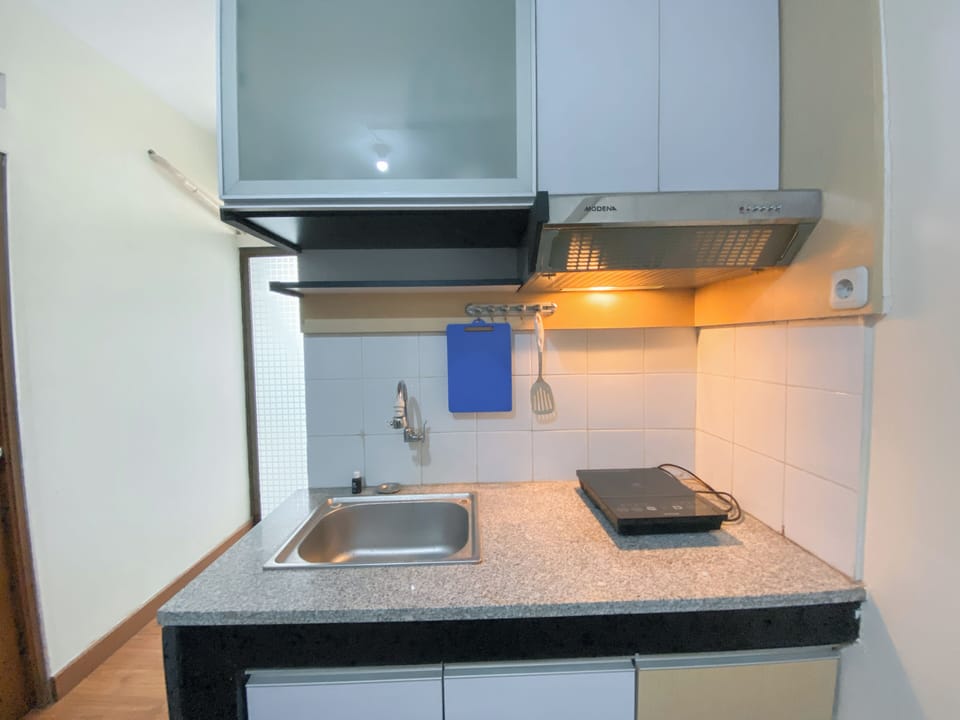 Apartment | Private kitchen | Fridge, stovetop, rice cooker, dining tables