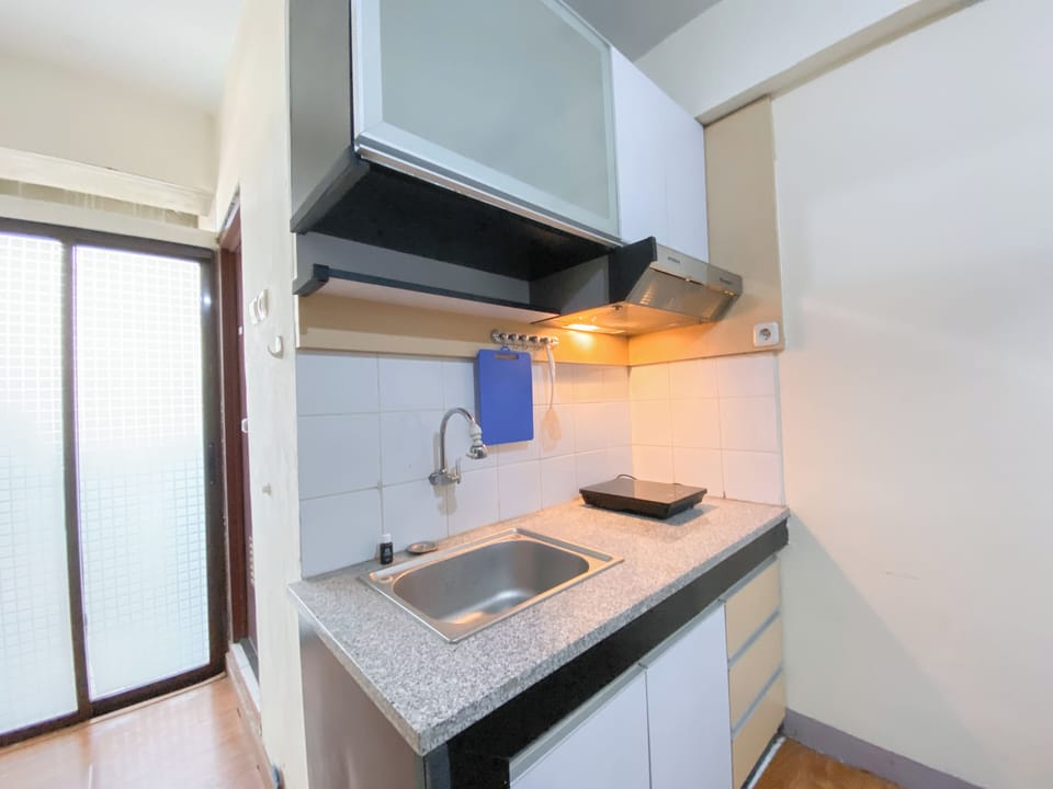 Apartment | Private kitchen | Fridge, stovetop, rice cooker, dining tables