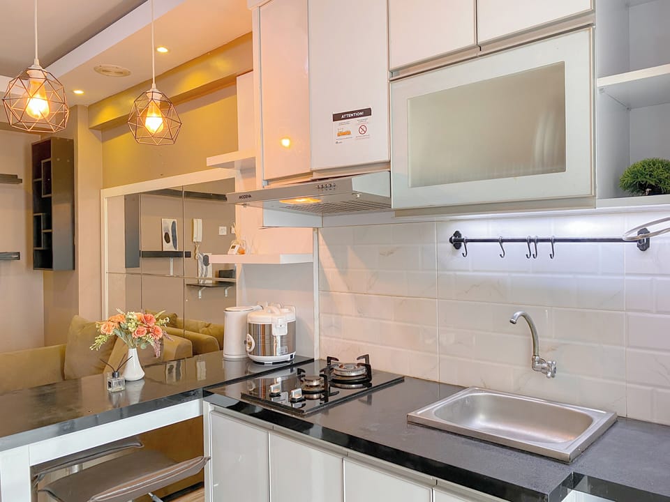 Apartment | Private kitchen | Fridge, stovetop, rice cooker, dining tables