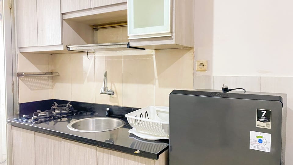 Apartment | Private kitchen | Fridge, stovetop, rice cooker, dining tables