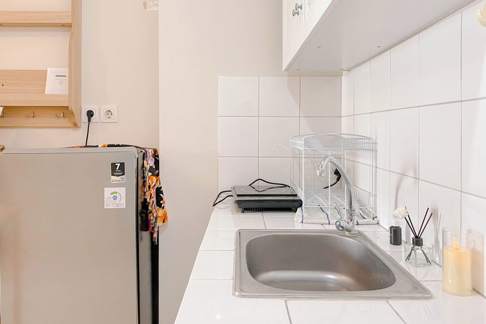 Apartment | Private kitchen | Fridge, stovetop, rice cooker, dining tables