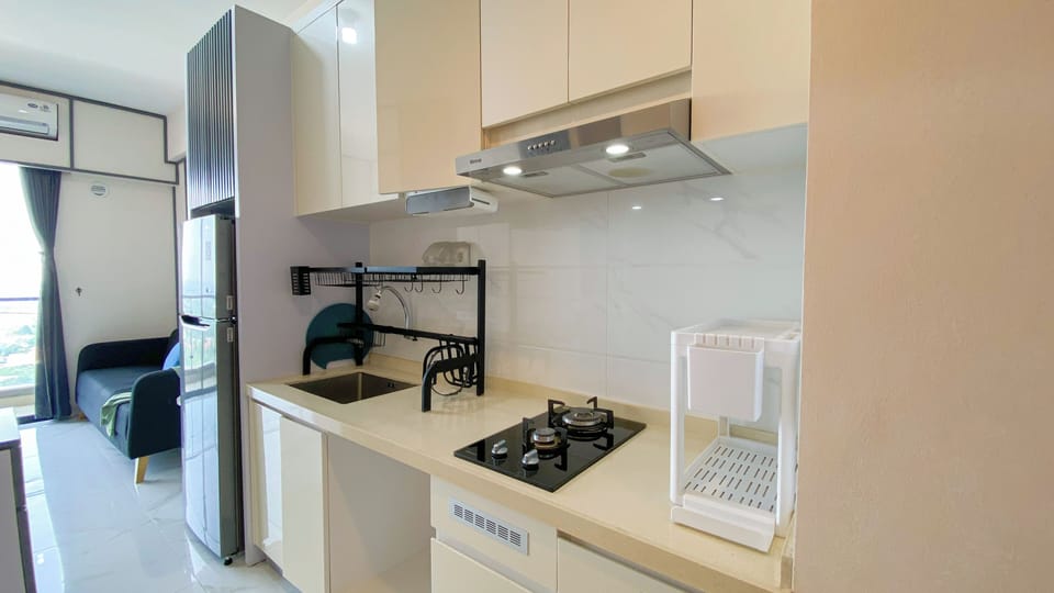 Apartment | Private kitchen | Fridge, stovetop, rice cooker, dining tables