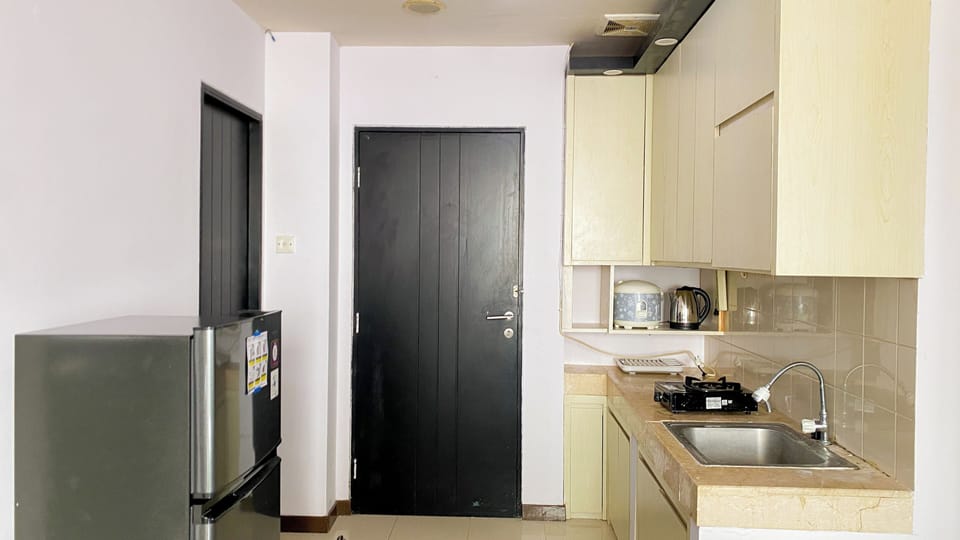 Apartment | Private kitchen | Fridge, stovetop, rice cooker, dining tables