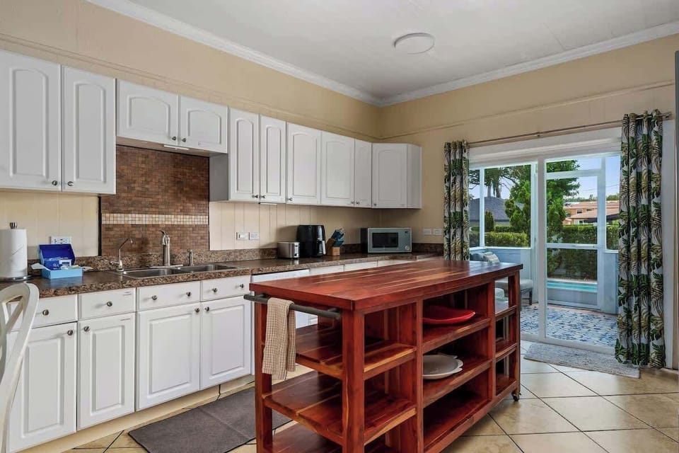 Plenty of cabinet space and room under the large island for all of your food and snacks.