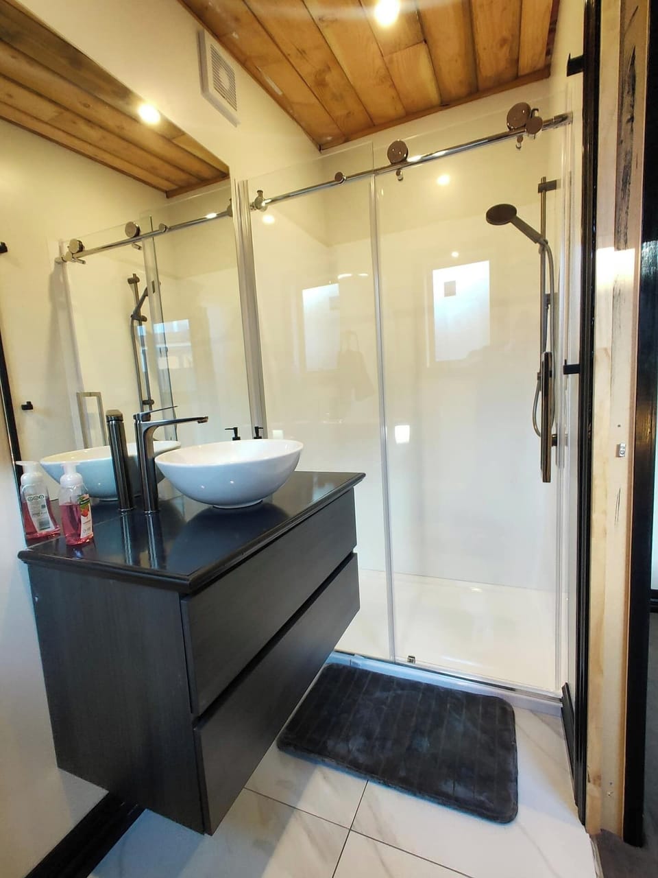 This bathroom is an ensuite off the main bedroom (so guest sleeping in the mezzanine only have access through the bedroom).