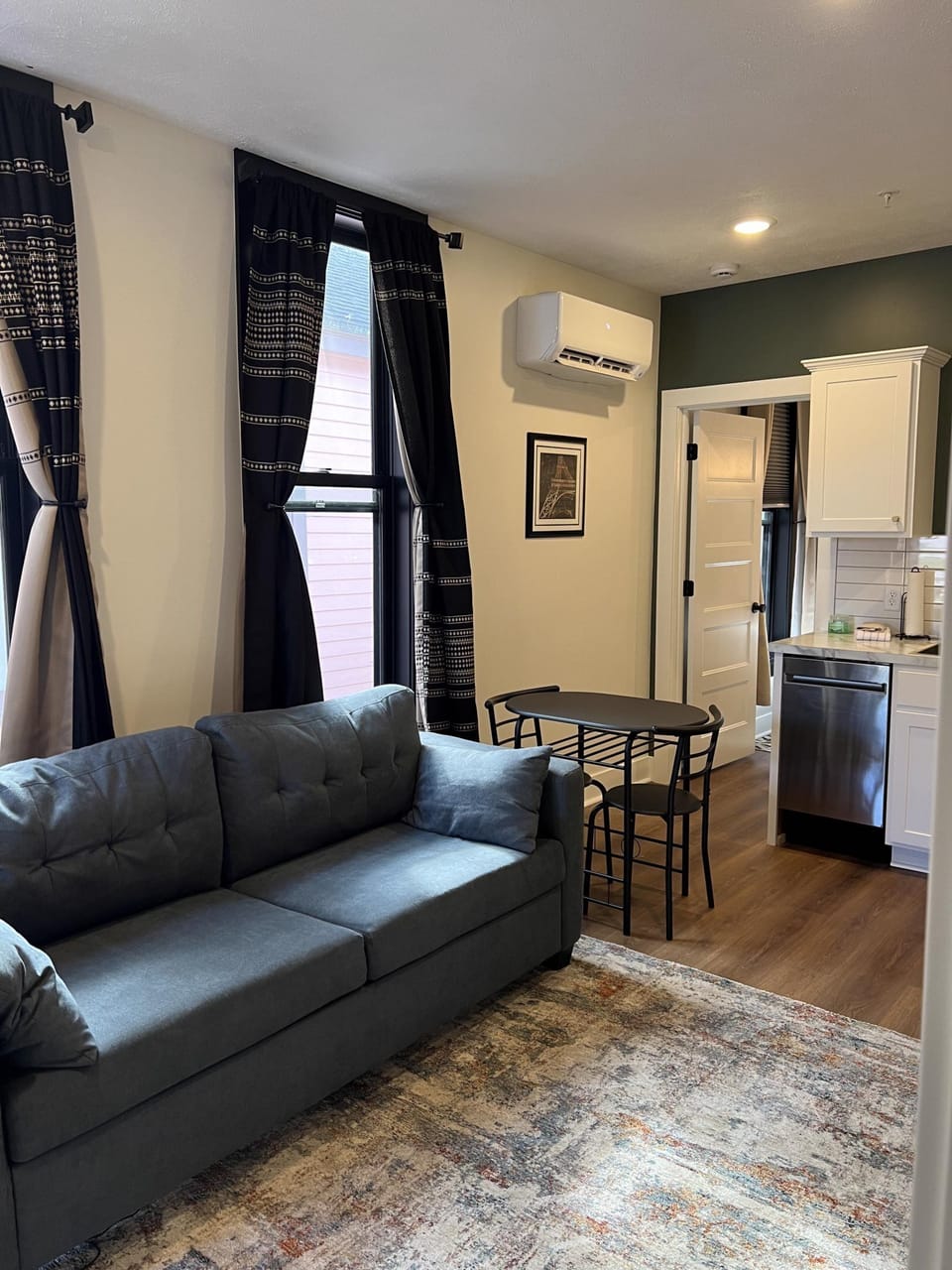 Urban Queen at the Victorian Unit D living area with sofa bed.