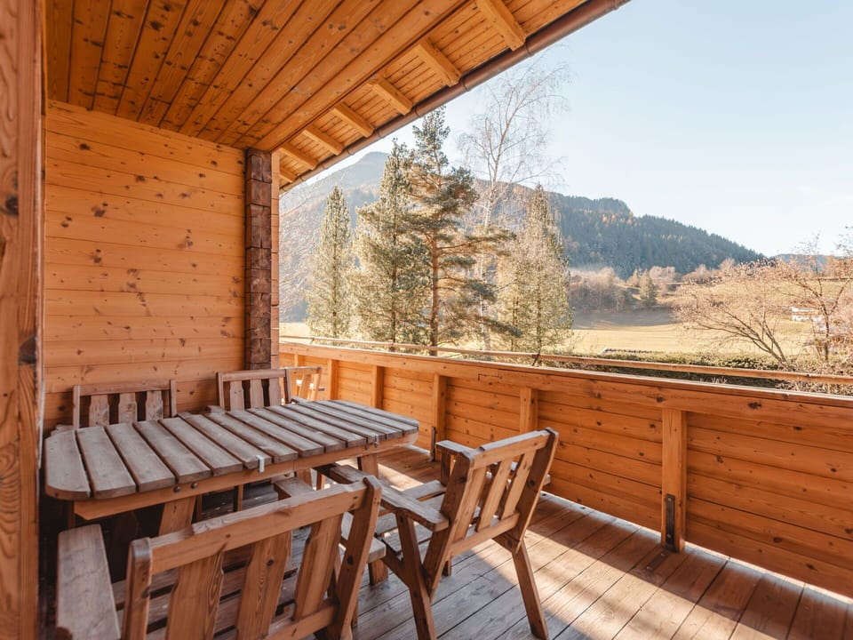Furniture, Sky, Tree, Wood, Table, Building, Chair, Wood Stain, Cottage, Porch