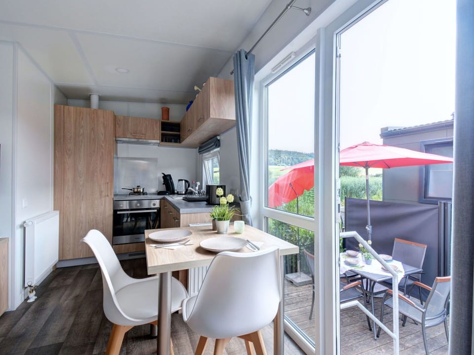 Furniture, Table, Property, Chair, Plant, Interior Design, Living Room, Wood, Floor, Flooring