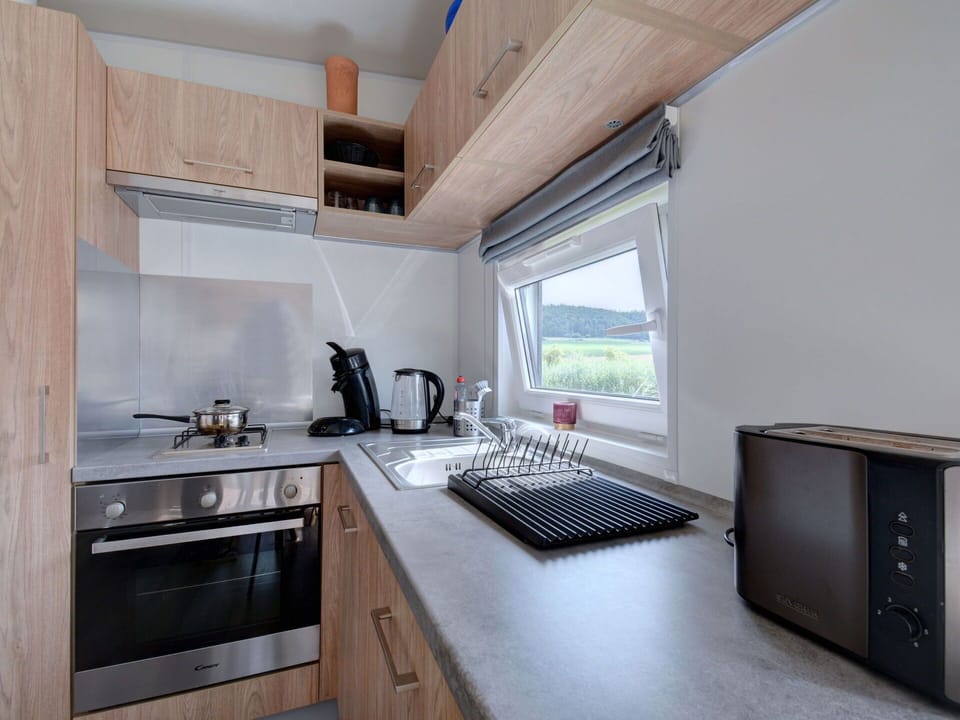 Cabinetry, Property, Furniture, Countertop, Kitchen Appliance, Kitchen Stove, Kitchen, Building, Wood, Interior Design
