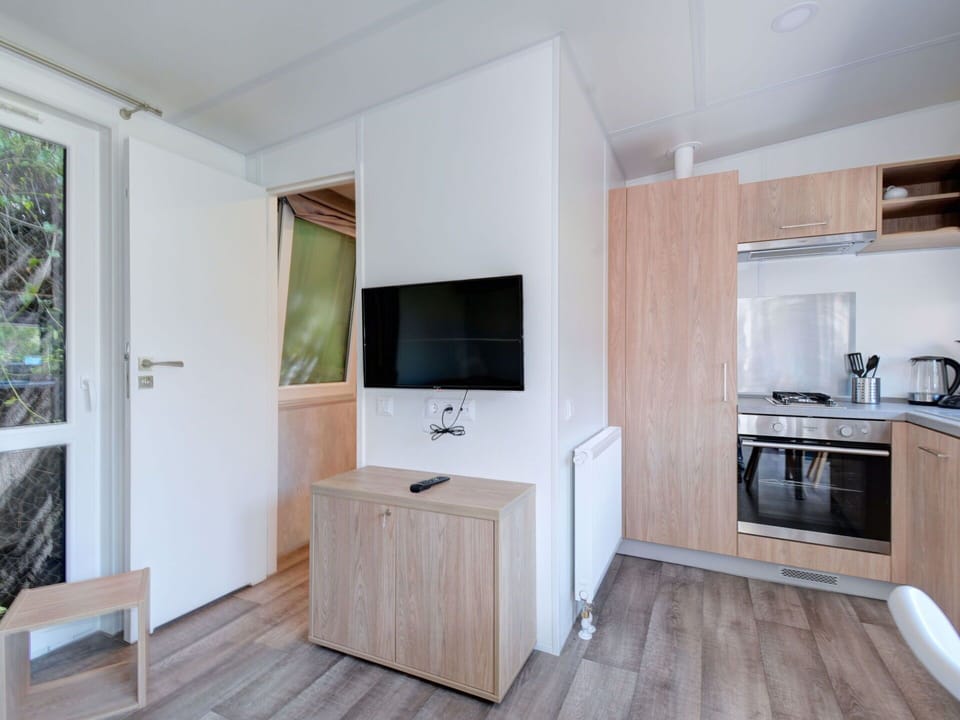 Cabinetry, Furniture, Wood, Flooring, Kitchen Appliance, Countertop, Floor, Building, Kitchen Stove