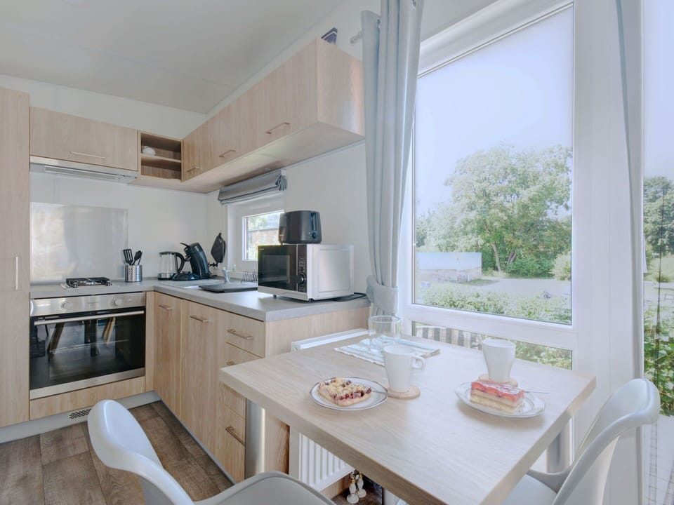 Furniture, Table, Property, Cabinetry, Countertop, Wood, Sink, Interior Design, Kitchen, Kitchen Appliance