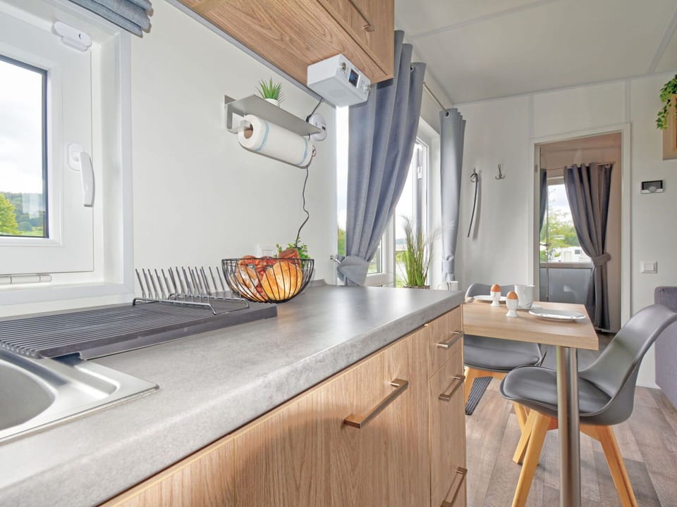 Cabinetry, Furniture, Property, Countertop, Window, Kitchen Sink, Table, Kitchen, Wood, Building
