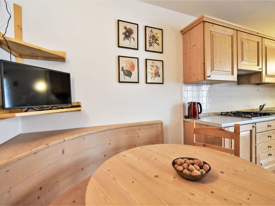 Cabinetry, Property, Furniture, Table, Wood, Interior Design, Countertop, Kitchen Appliance, Lighting, Flooring