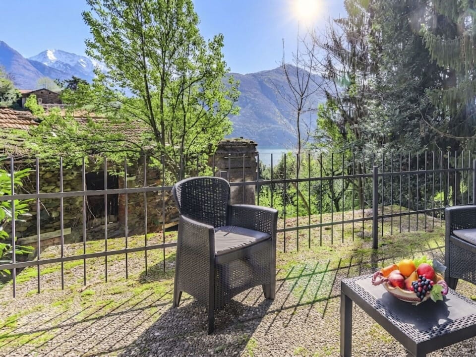 Furniture, Chair, Mountain Range, Outdoor Furniture, Balcony, Valley, Eco Hotel, Houseplant, Fence, Resort
