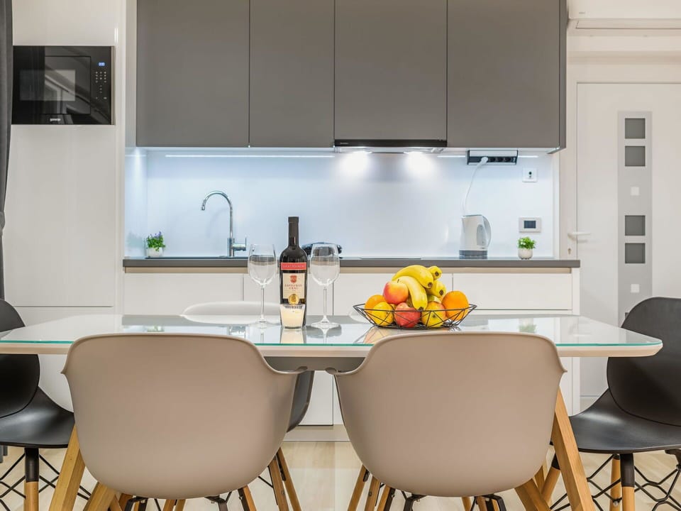 Cabinetry, Furniture, Countertop, Kitchen, Chair, Interior Design, Orange, Table, Floor, Line