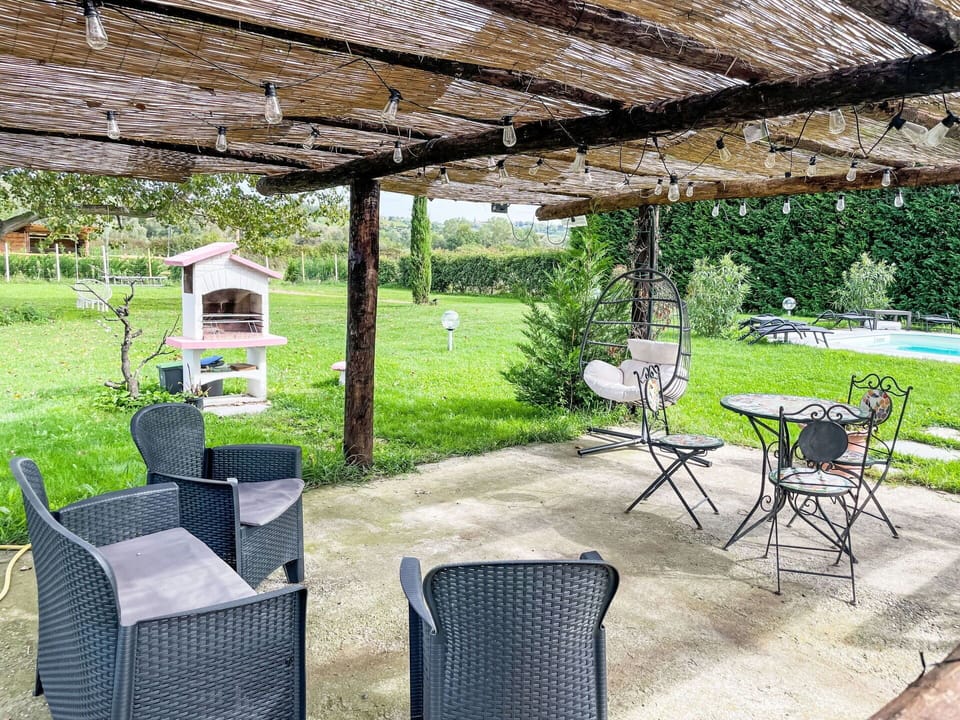 Furniture, Outdoor Furniture, Shade, Outdoor Table, Garden, Outdoor Structure, Chair, Backyard, Lawn, Yard