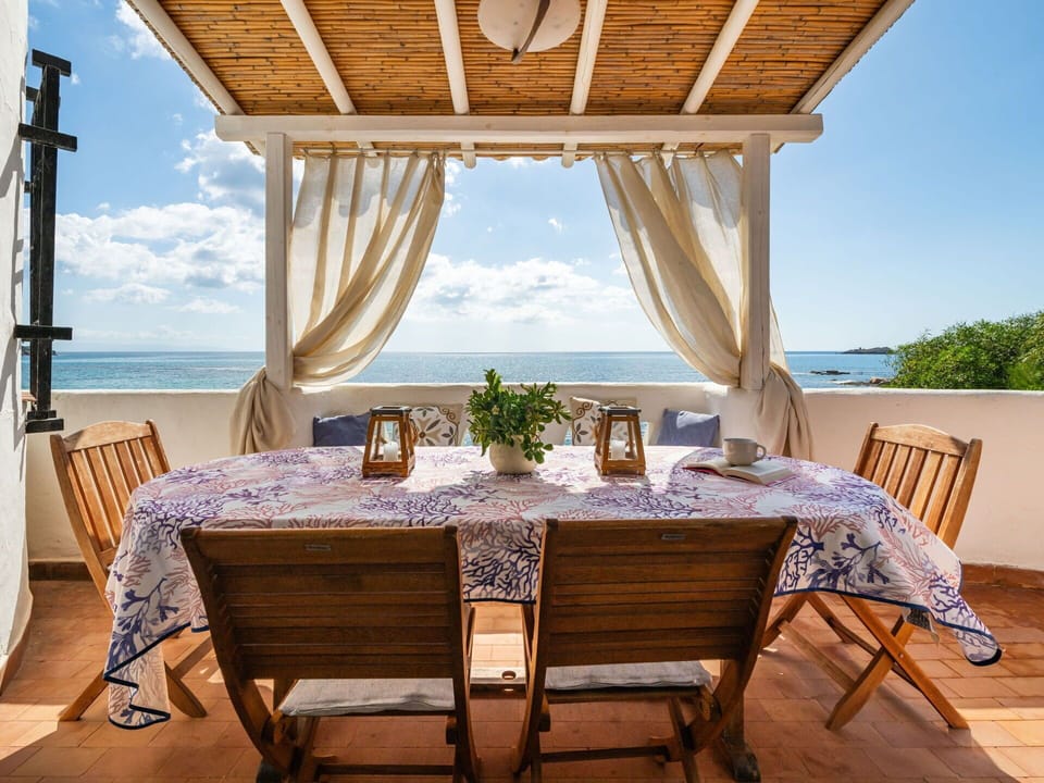 Furniture, Table, Sky, Property, Water, Chair, Plant, Blue, Interior Design, Shade