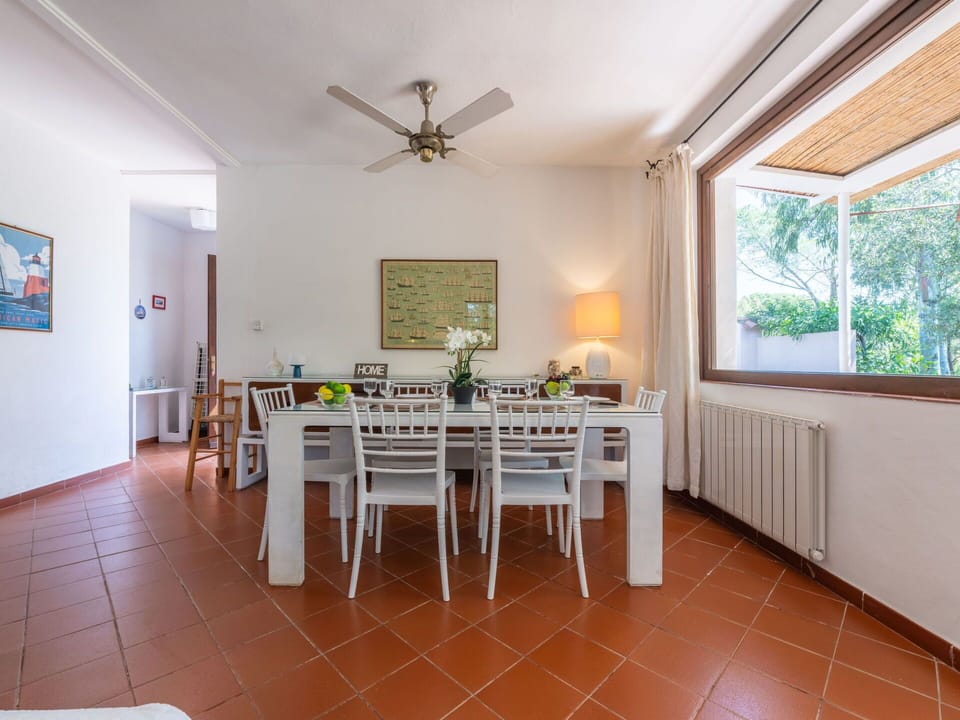 Furniture, Table, Property, Picture Frame, Wood, Chair, Ceiling Fan, Window, Lighting, Interior Design