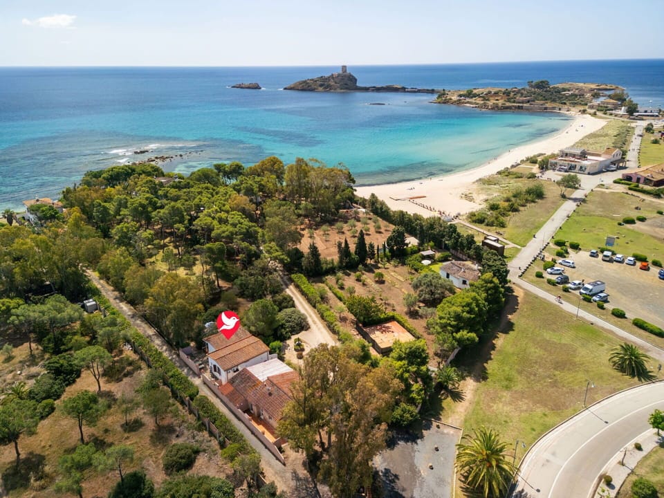 Water, Sky, Plant, Building, Azure, Tree, Beach, Coastal And Oceanic Landforms, Leisure