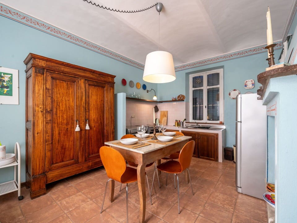 Furniture, Interior Design, Flooring, Wood, Ceiling, Floor, Room, Cabinetry, Table, Chair