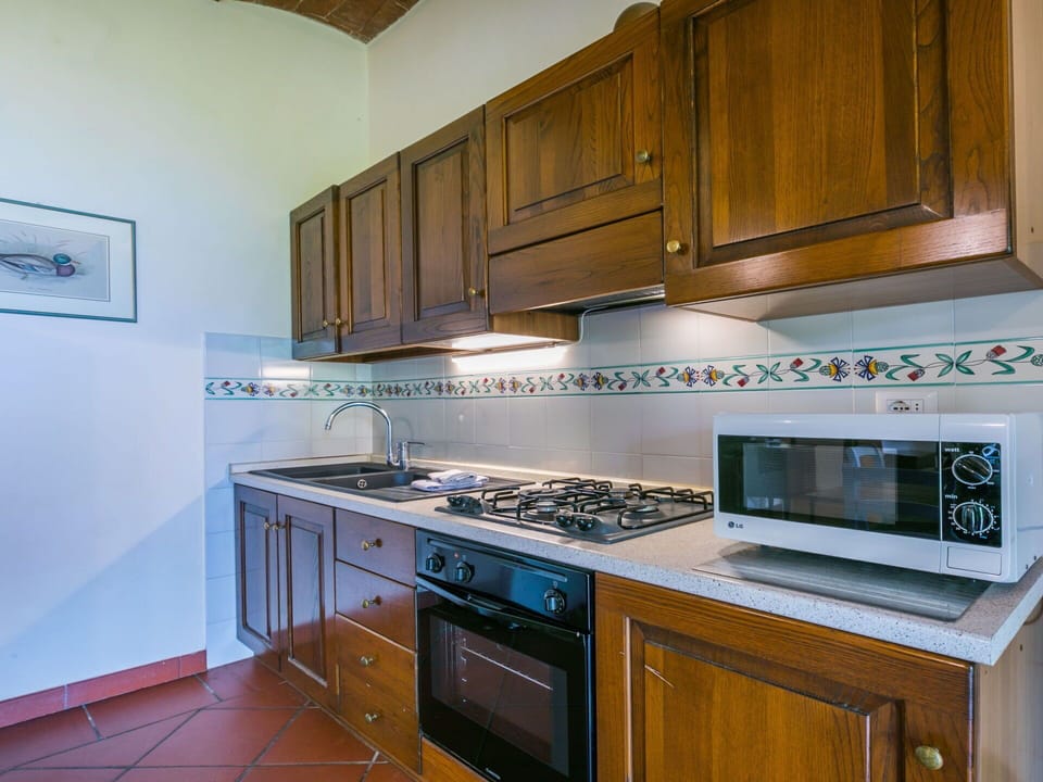 Cabinetry, Countertop, Property, Furniture, Kitchen Appliance, Kitchen Stove, Kitchen, Home Appliance, Wood, Interior Design