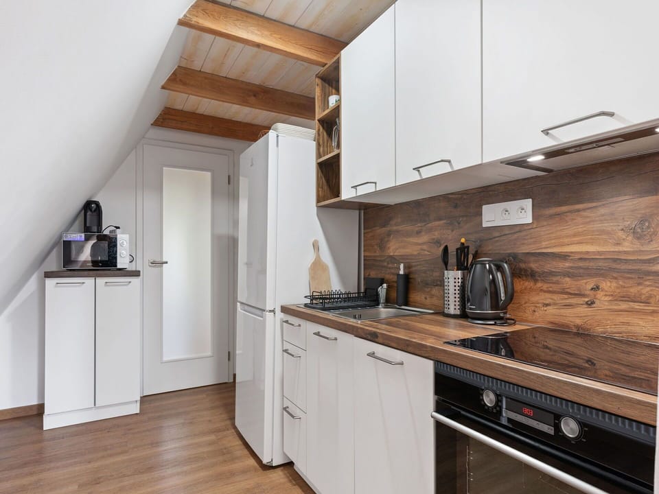 Wood, Flooring, Interior Design, Floor, Kitchen, Wood Flooring, Cabinetry, Countertop, Major Appliance, Furniture