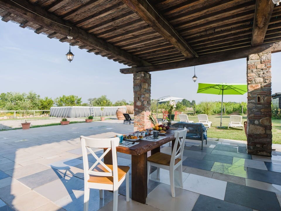 Furniture, Chair, Table, Outdoor Furniture, Flooring, Kitchen & Dining Room Table, Outdoor Table, Shade, Floor, Patio