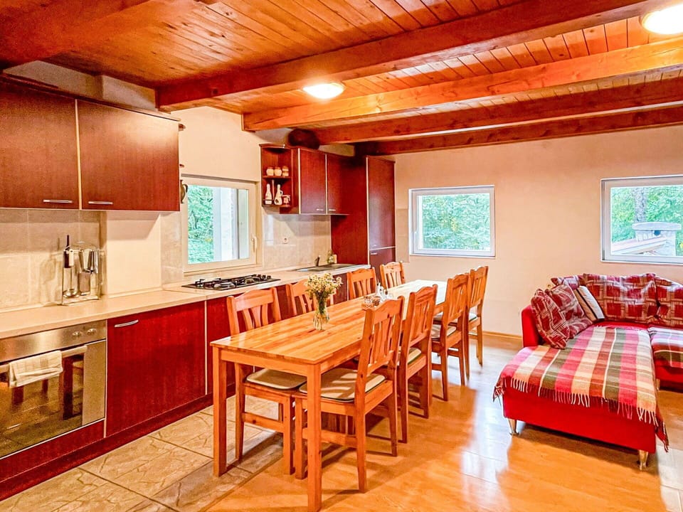 Table, Furniture, Countertop, Wood, Interior Design, Cabinetry, Floor, Flooring, Chair, Hardwood