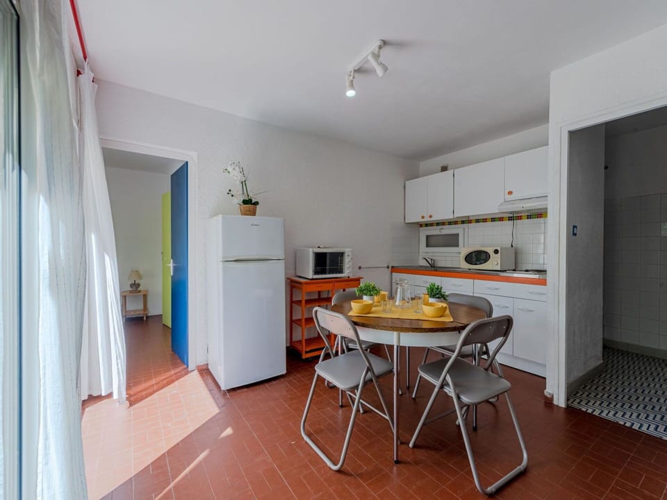 Furniture, Property, Table, Cabinetry, Wood, Orange, Interior Design, Chair, Floor, Flooring
