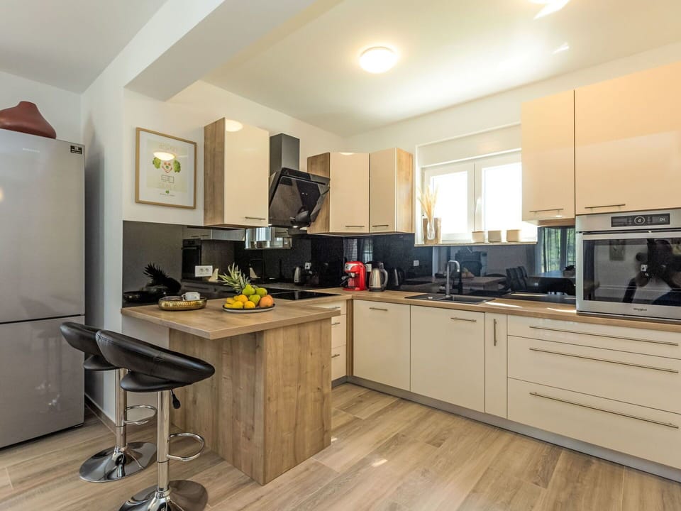 Cabinetry, Property, Furniture, Countertop, Drawer, Interior Design, Sink, Building, Wood, Kitchen