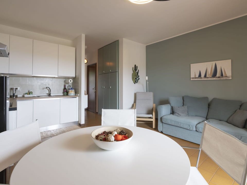 Furniture, Table, Property, Couch, Interior Design, Living Room, Comfort, Floor, Cabinetry, Wall