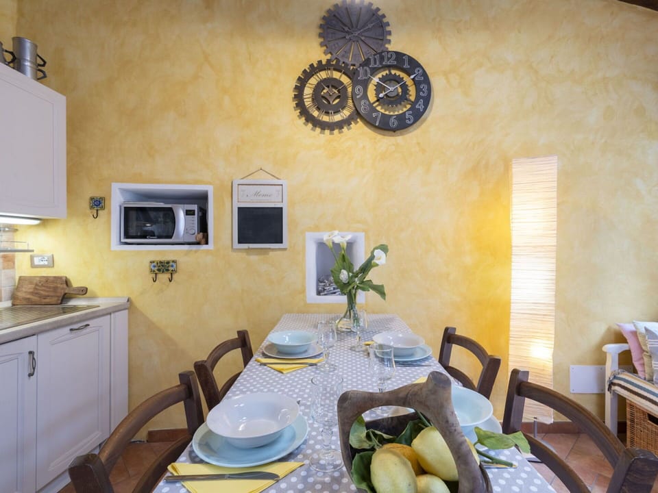 Table, Tableware, Furniture, Plant, Cabinetry, Chair, Picture Frame, Building, Lighting, Interior Design