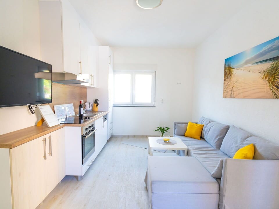Cabinetry, Furniture, Couch, Countertop, Building, Window, Kitchen Appliance, Interior Design, Studio Couch, Floor