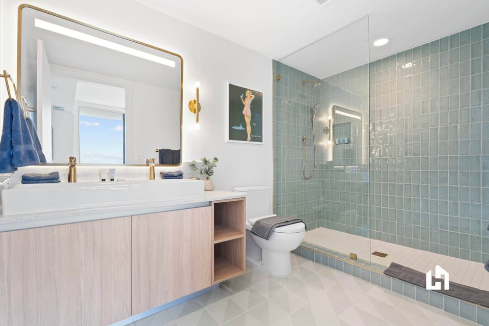 The master bath has a super spacious walk-in shower