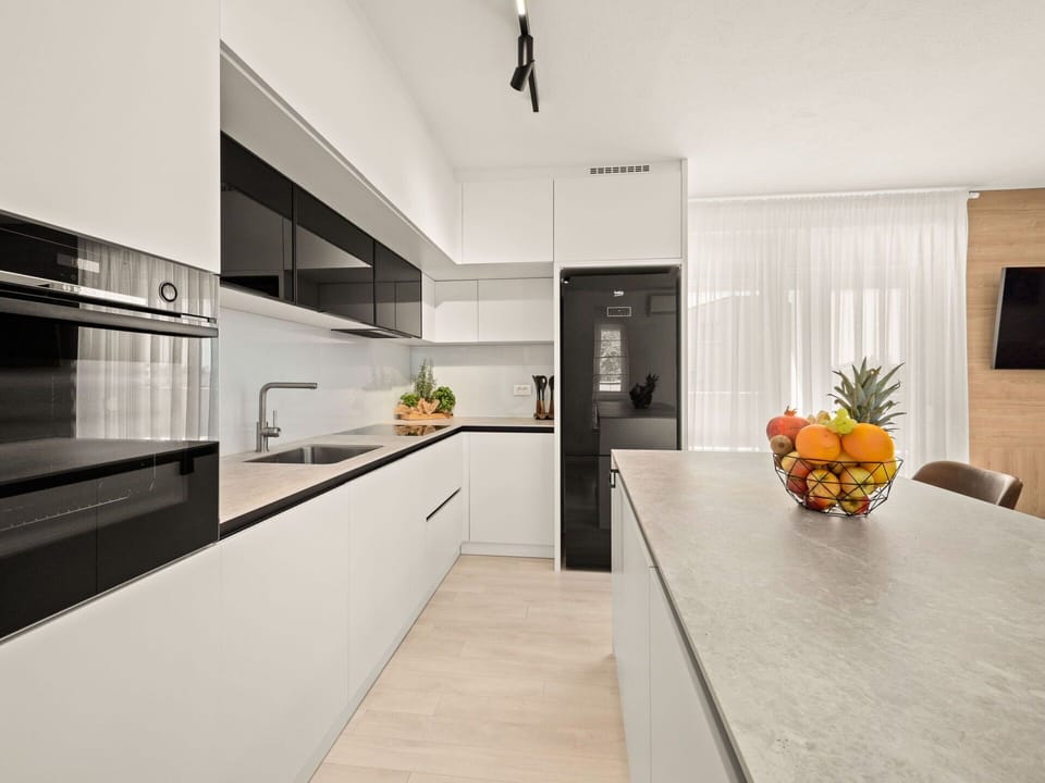 Countertop, Cabinetry, Furniture, Plant, Building, Kitchen, Interior Design, Wood, Houseplant, Floor