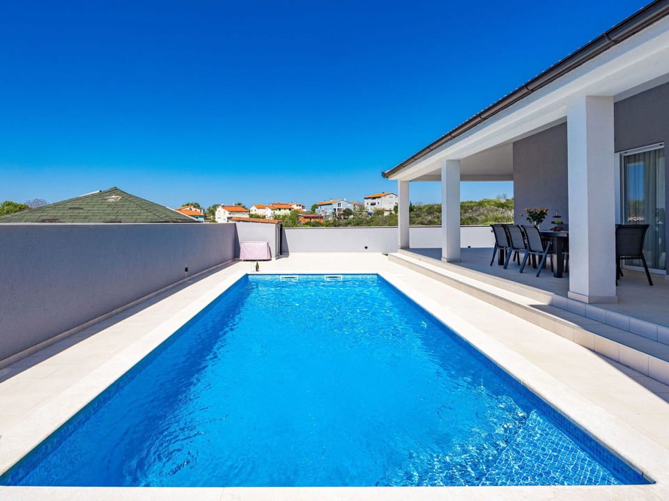 Water, Sky, Property, Building, Swimming Pool, Blue, Azure, Shade, House, Outdoor Furniture