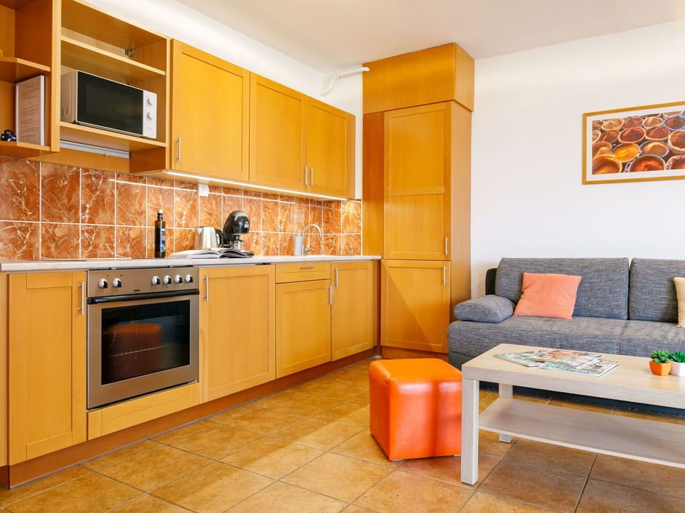Furniture, Cabinetry, Countertop, Sink, Building, Wood, Couch, Tap, Interior Design, Orange