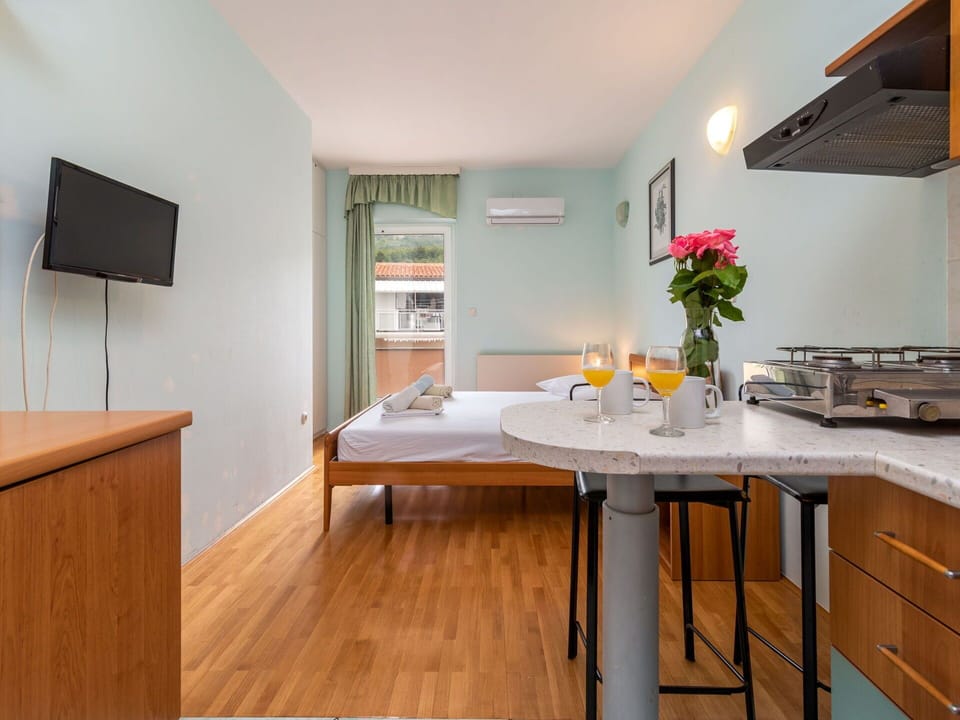 Flower, Furniture, Table, Countertop, Cabinetry, Wood, Interior Design, Kitchen, Floor, Flooring