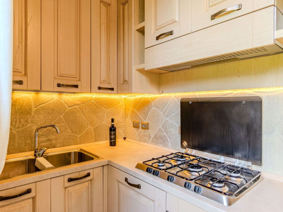 Brown, Cabinetry, Property, Countertop, Kitchen Sink, Sink, Kitchen, Gas Stove, Tap, Wood