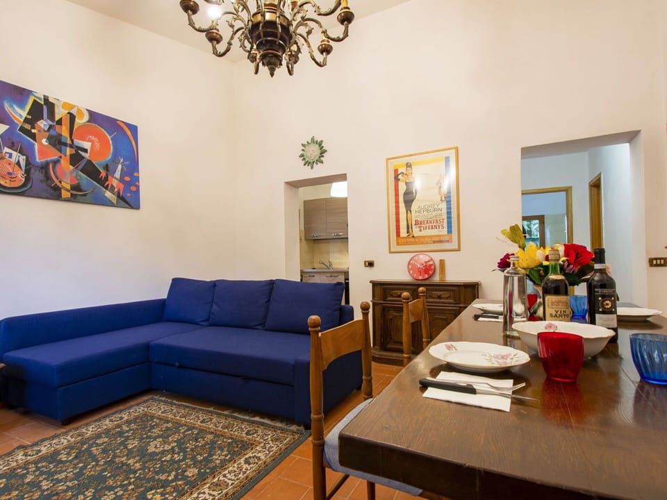 Furniture, Property, Table, Picture Frame, Plant, Couch, Blue, Lighting, Interior Design, Floor