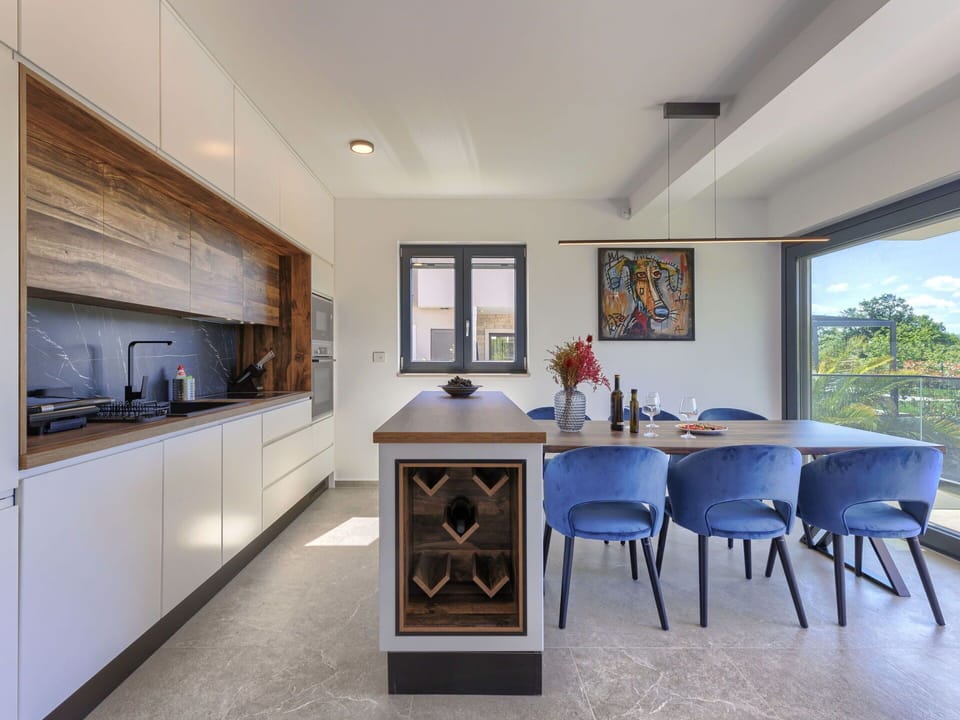Furniture, Property, Plant, Cabinetry, Countertop, Table, Wood, Houseplant, Flooring, Floor