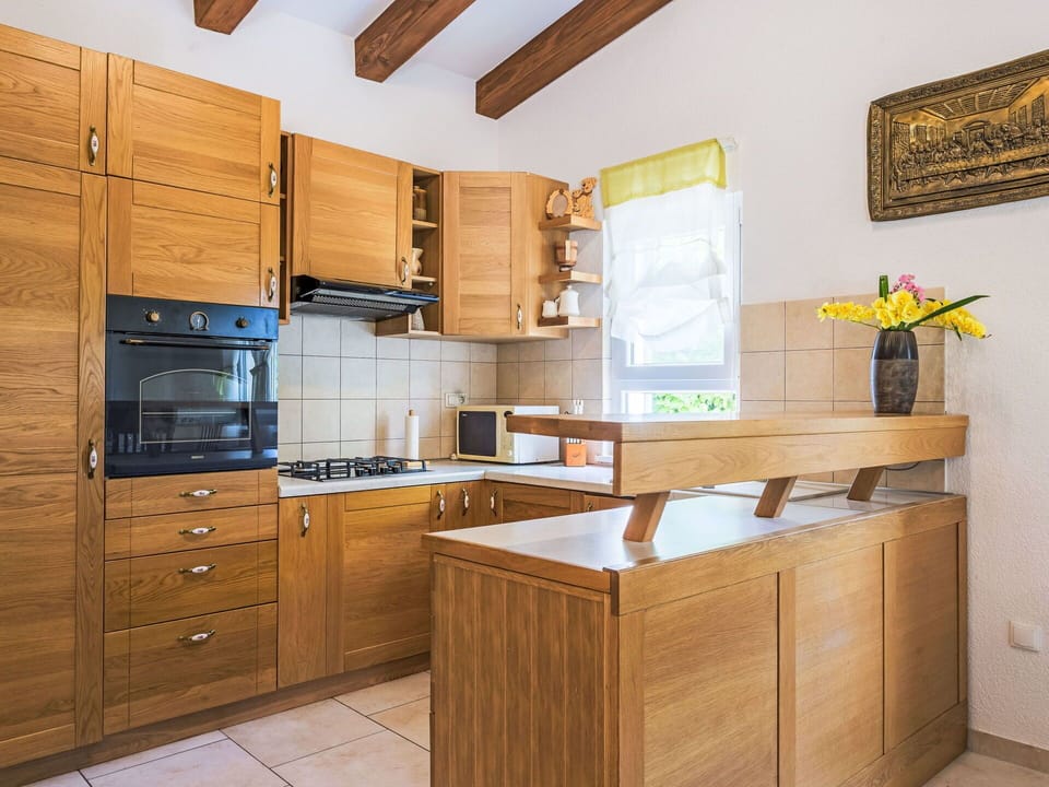Cabinetry, Countertop, Property, Furniture, Building, Drawer, Picture Frame, Wood, Kitchen Appliance, Kitchen