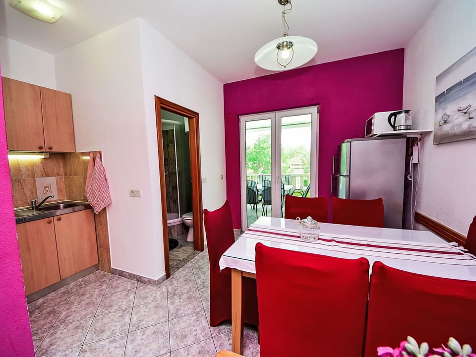 Picture Frame, Furniture, Decoration, Cabinetry, Purple, Lighting, Table, Building, Pink, Floor