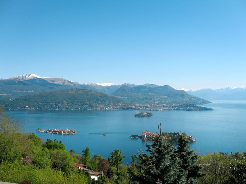 Water, Sky, Water Resources, Mountain, Plant, Boat, Nature, Azure, Tree, Natural Landscape